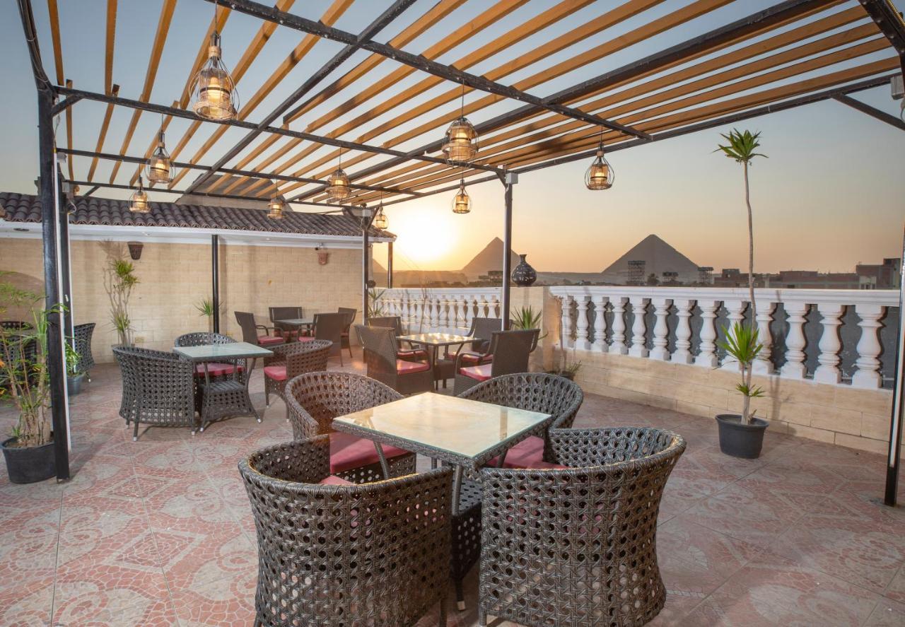 Pyramids Inn Hotel Kafret el-Gabal エクステリア 写真