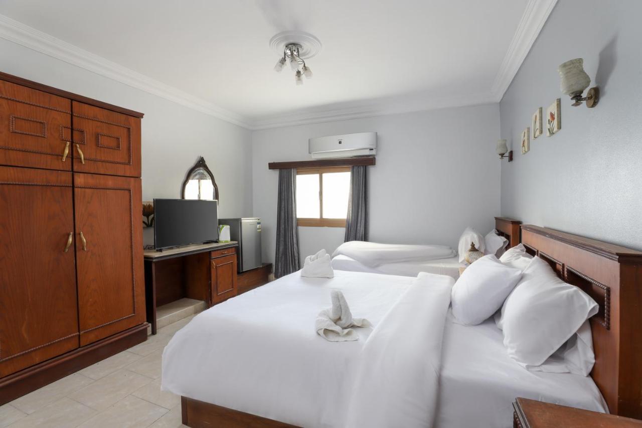 Pyramids Inn Hotel Kafret el-Gabal エクステリア 写真